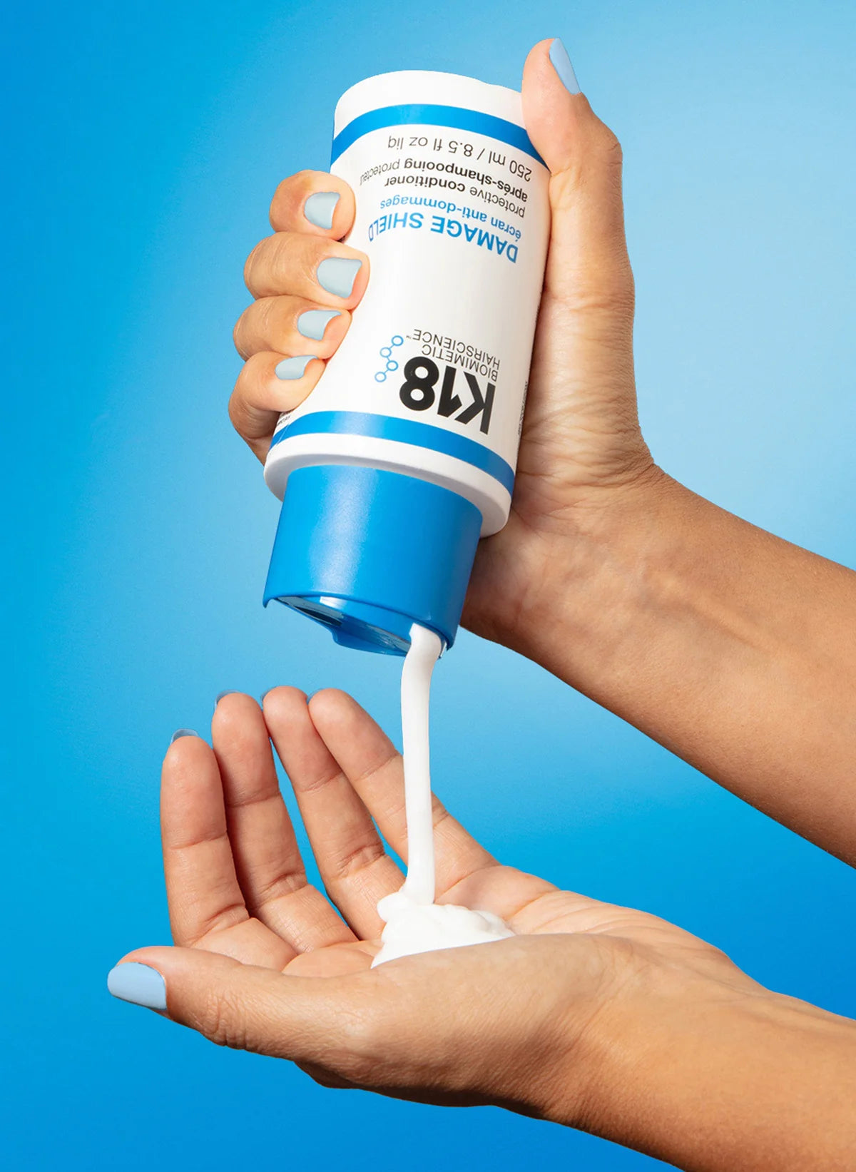 K18 Damage Shield Protective Conditioner 250ml on grey background