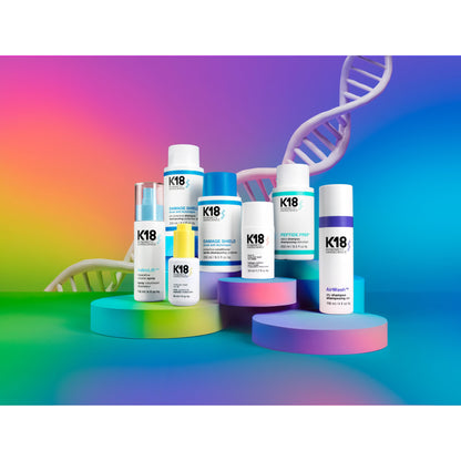 K18 Damage Shield pH Protective Shampoo 250ml on blue background